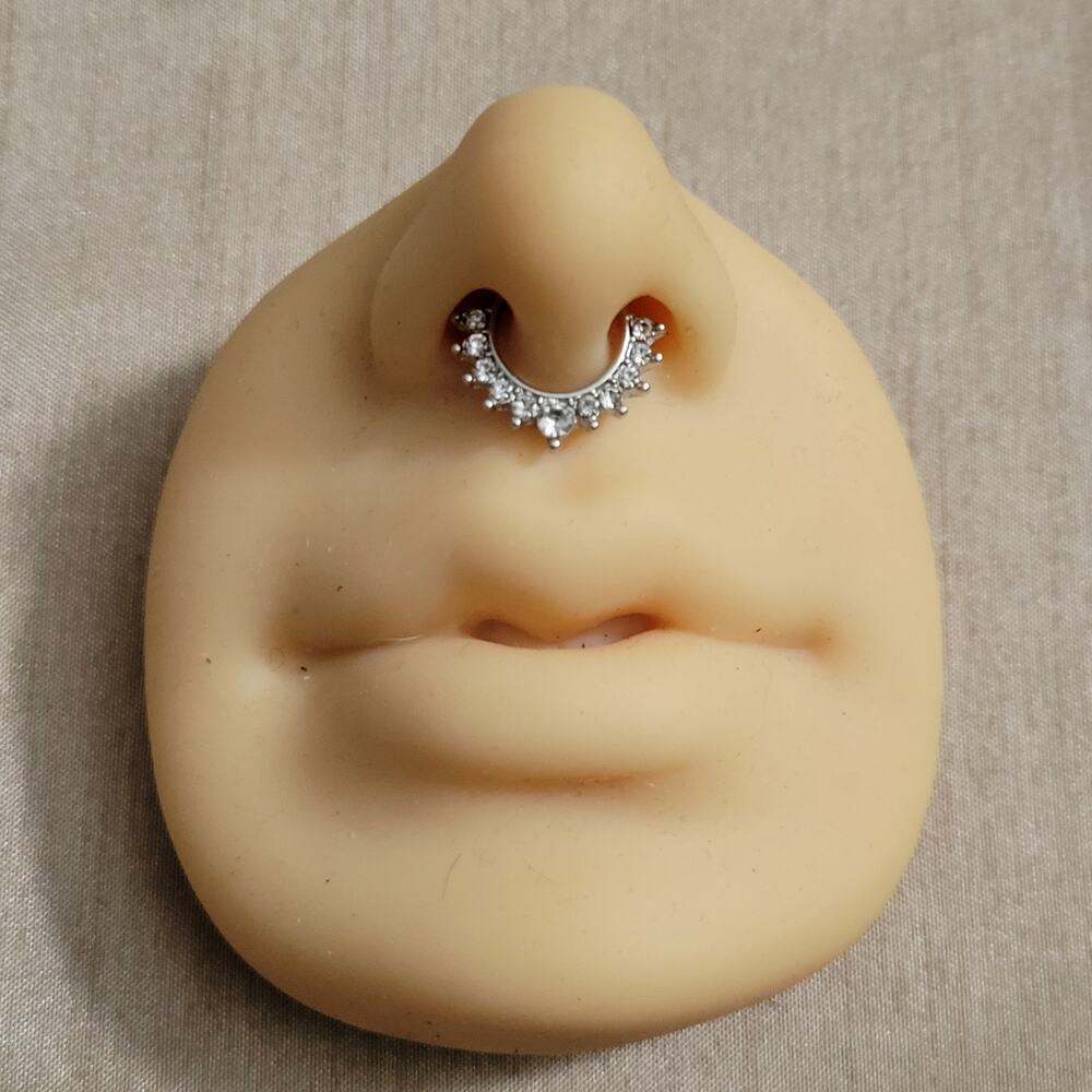 Silver tone clip on crystal septum ring